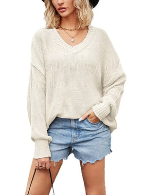 Khaki v-neck sweater with exposed seam and long sleeve