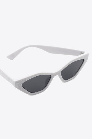 Geometric cat-eye sunglasses in light gray with a marbled pattern and dark lenses.