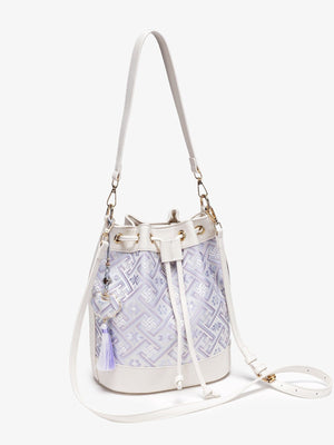 crossbody bag in White with geometric and drawstring closure