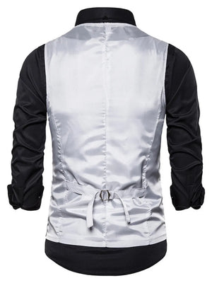 Silver sequin men's vest with adjustable back strap, worn over a black shirt.