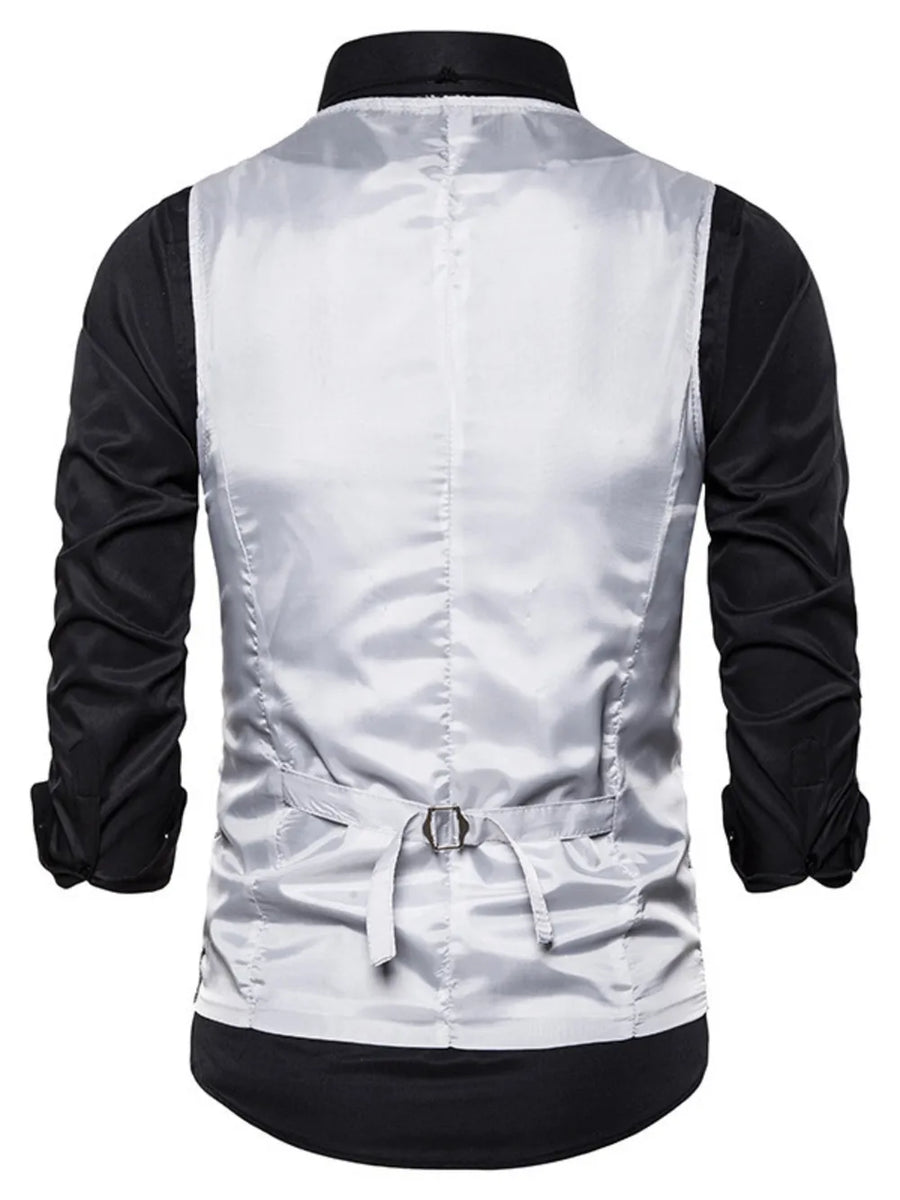 Silver sequin men's vest with adjustable back strap, worn over a black shirt.