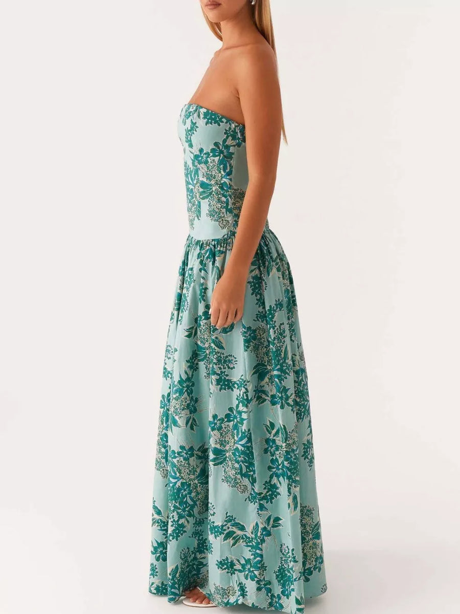 Turquoise floral strapless maxi dress with a cinched waist and full skirt.