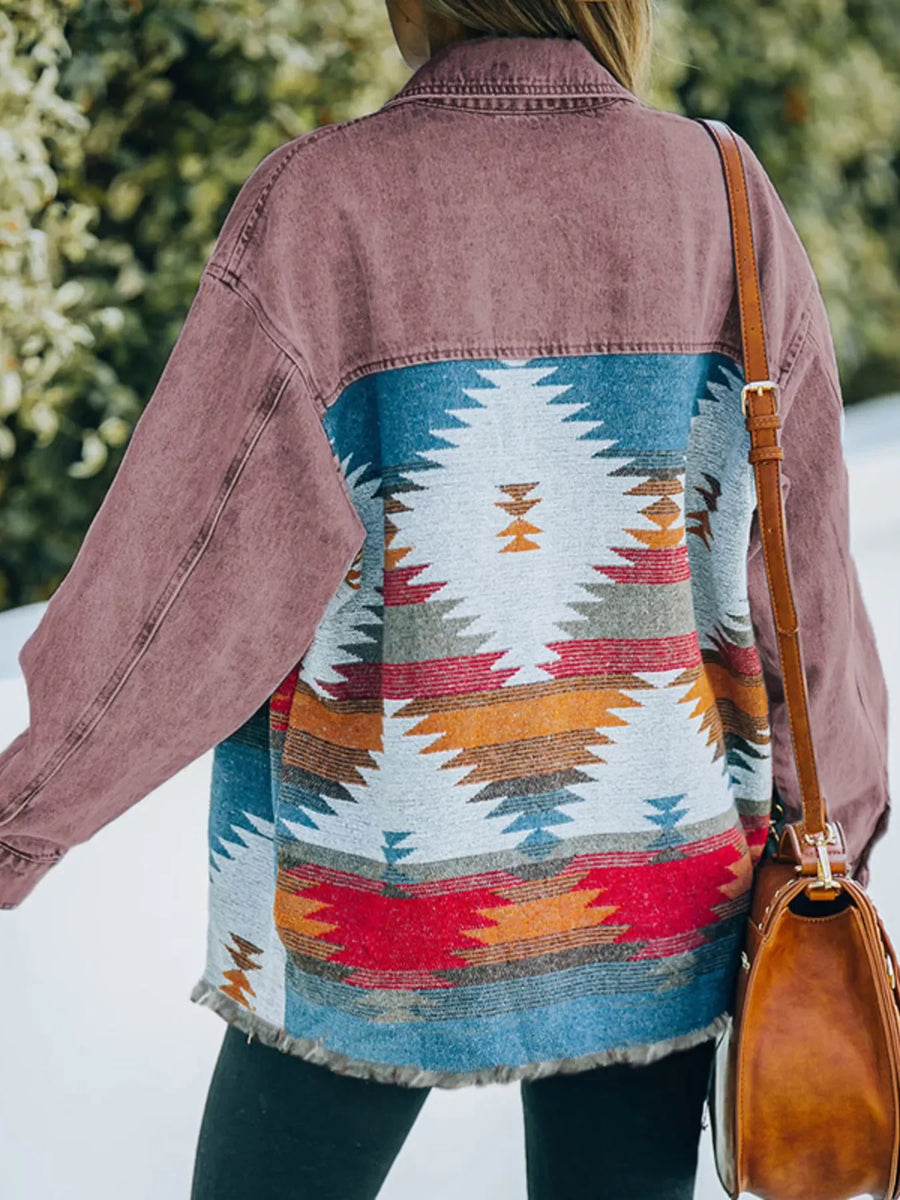 Aztec print oversized denim trucker jacket in strawberry with colorful geometric back panel and frayed hem.