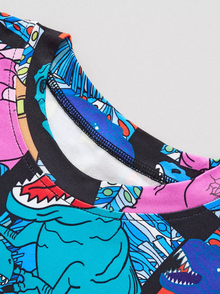 Crew neck t-shirt with a colorful cartoon dinosaur print and black trim.