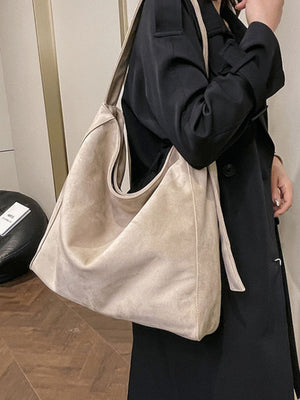 Suede Imported Size &amp crossbody bag in Black with relaxed silhouette