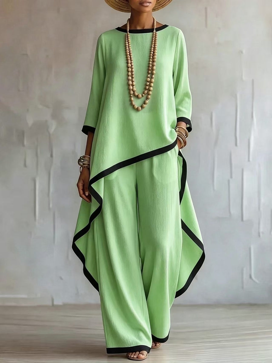 White two-piece set with asymmetrical hem and 3/4 sleeve