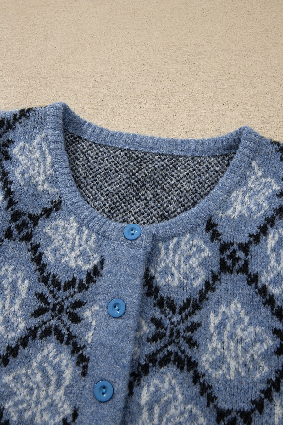 cardigan in Dusty Blue with geometric and buttoned