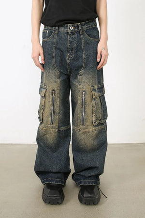 Distressed dark wash wide-leg cargo jeans with zip pockets and a relaxed fit.