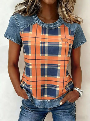 Denim patchwork shirt with orange and blue plaid print, short sleeves, and crew neck.