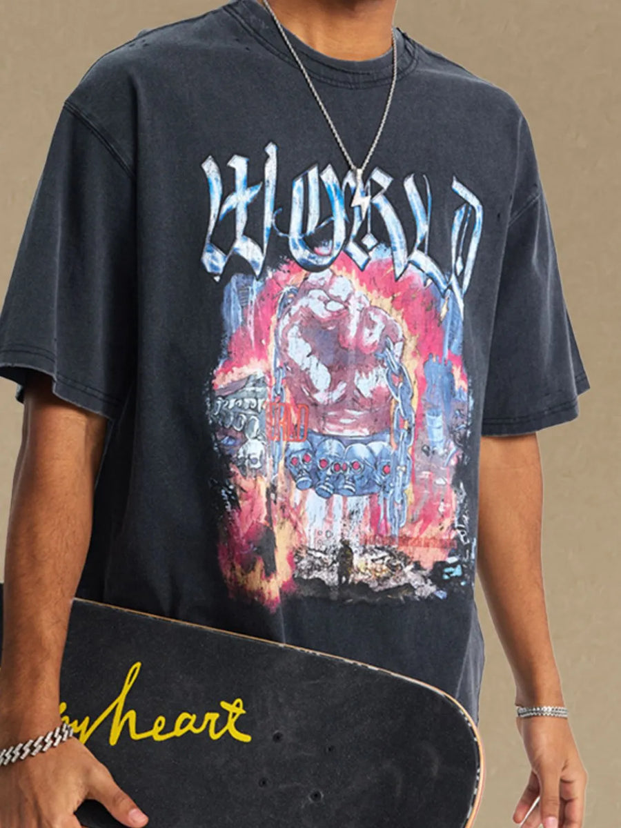 Black oversized graphic tee with distressed details and bold "WORLD" text graphic.