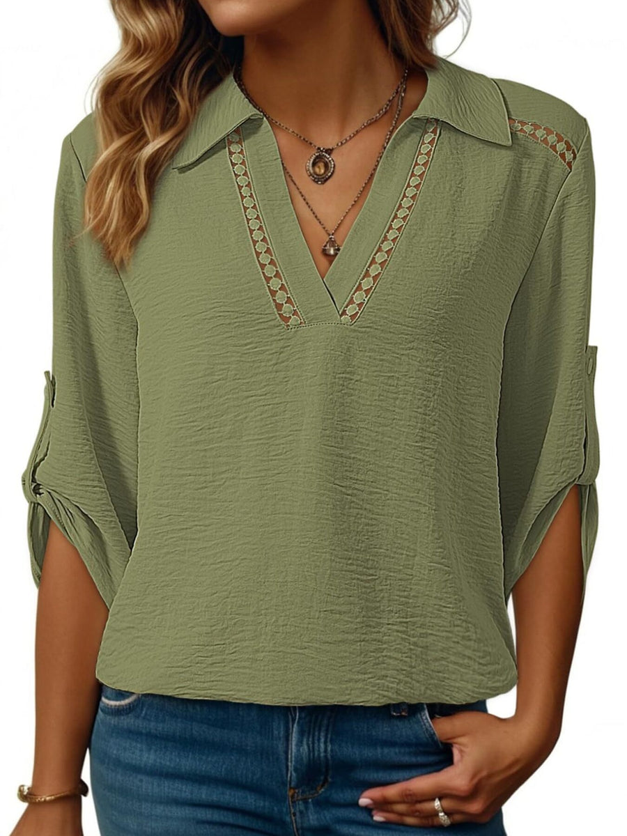 Army green crinkled texture shirt with Johnny collar, v-neck, and roll-tab sleeves.