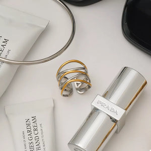 18K Gold-Plated,Stainless Steel Care instructions: Avoid wearing during exercise ring in silver with multi-band silhouette
