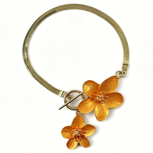 gold anklet with toggle clasp and floral