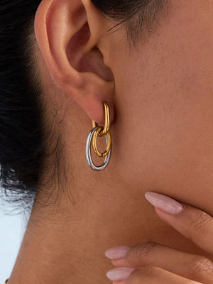 earrings in gold featuring two-tone and hoop fit