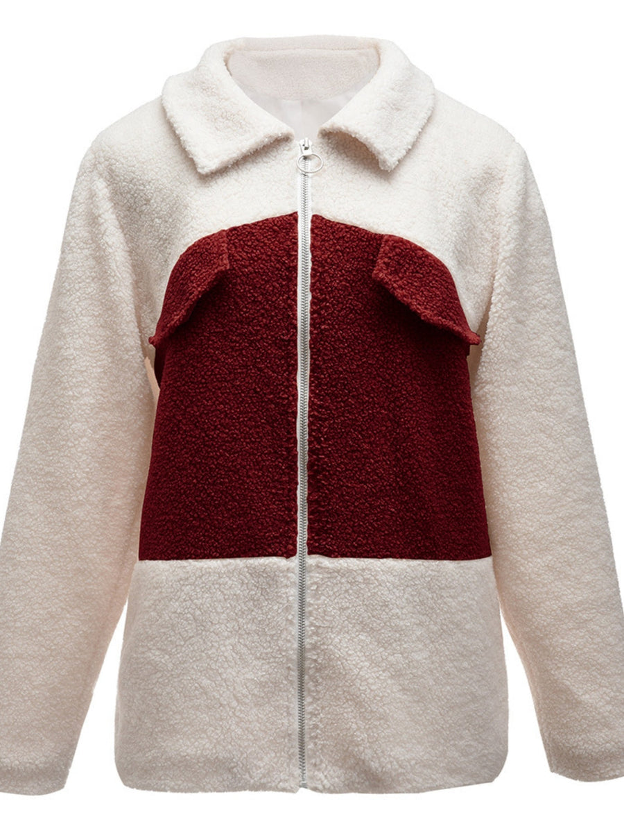 Colorblock shearling zip-up jacket in cream and burgundy with a collar and silver zipper.
