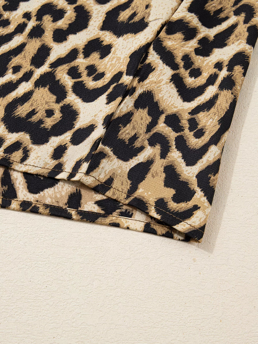Chic leopard print two-piece set with buttoned shirt detail.