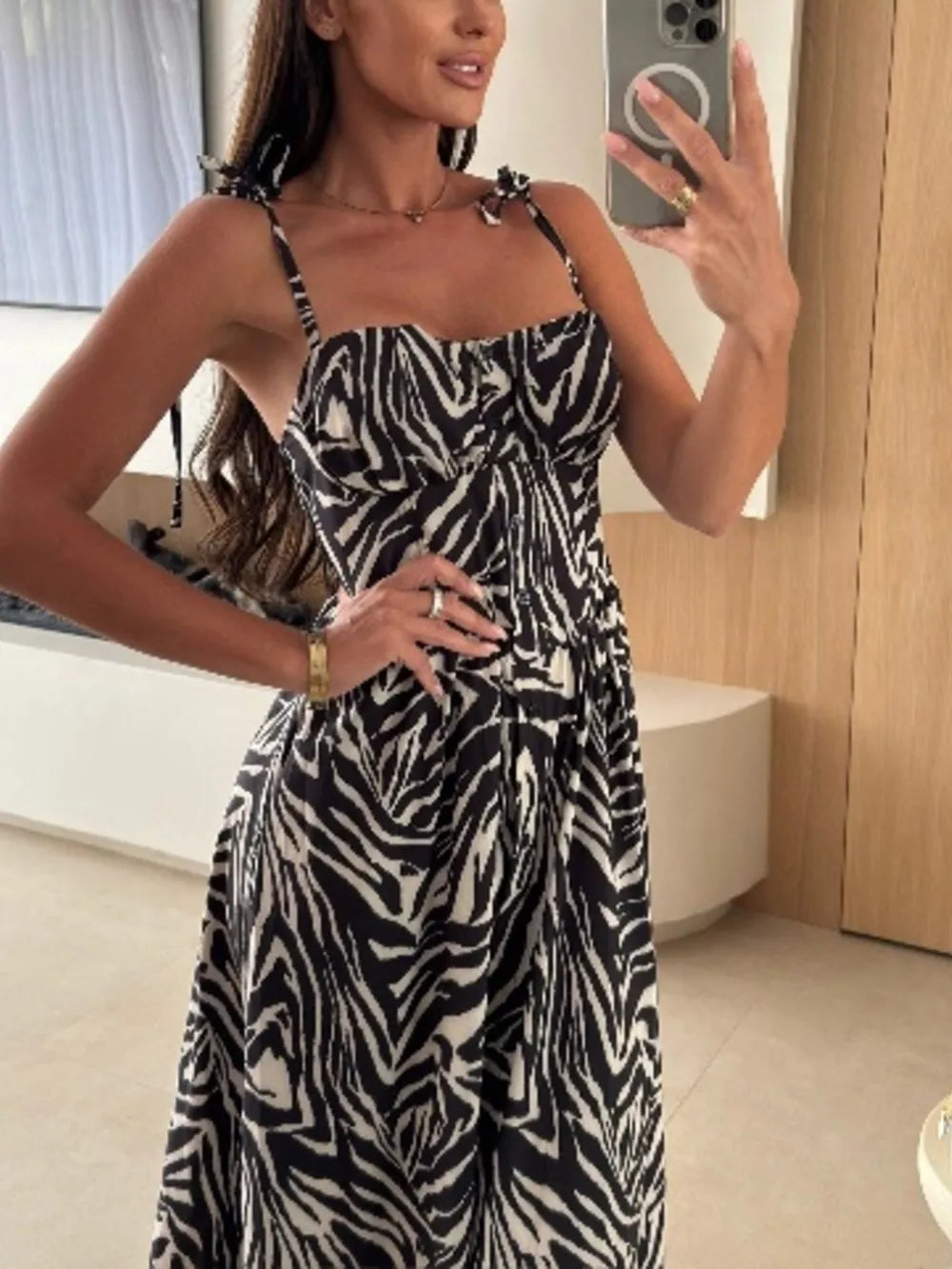 Floral tie-strap midi dress in zebra print with a sweetheart neckline and A-line skirt.
