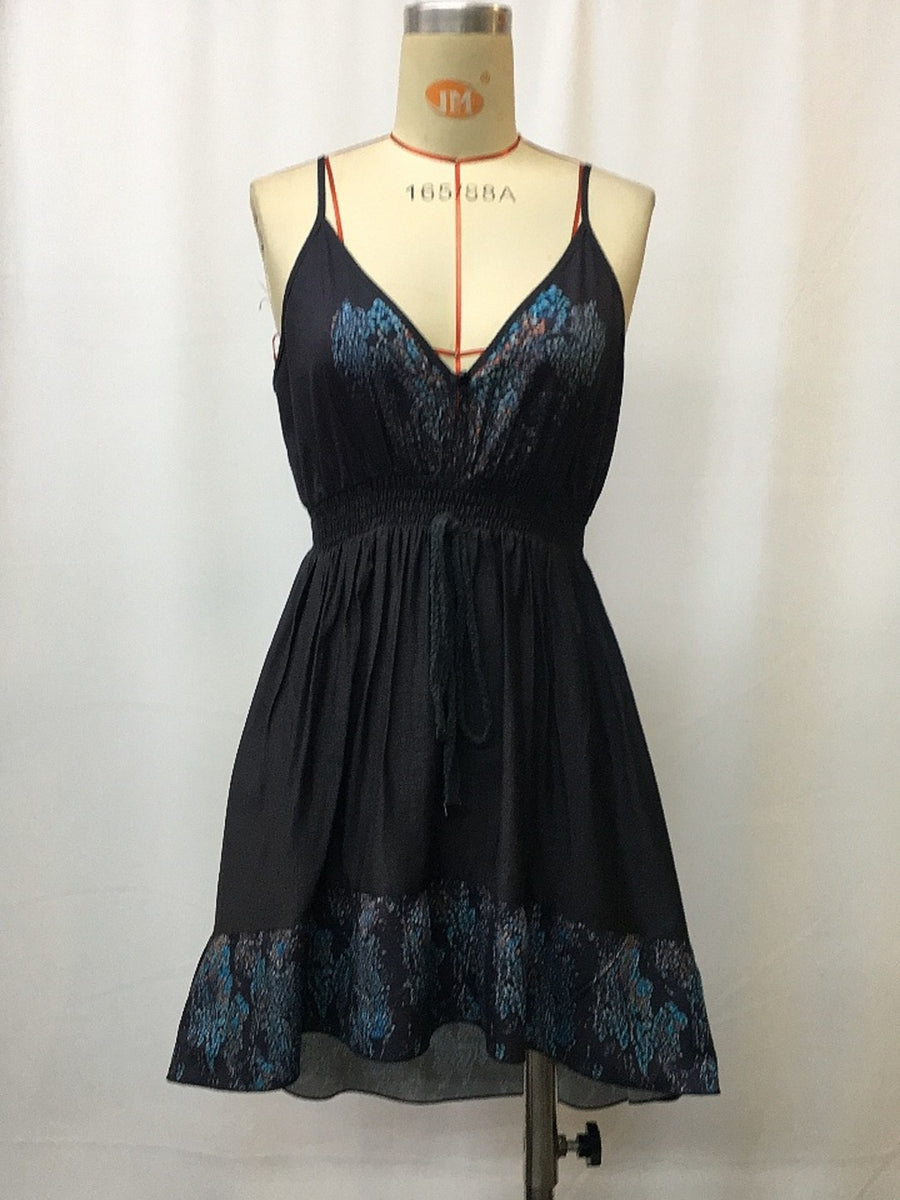 Black floral mini cami dress with V-neck, smocked waist, and ruffled hem.