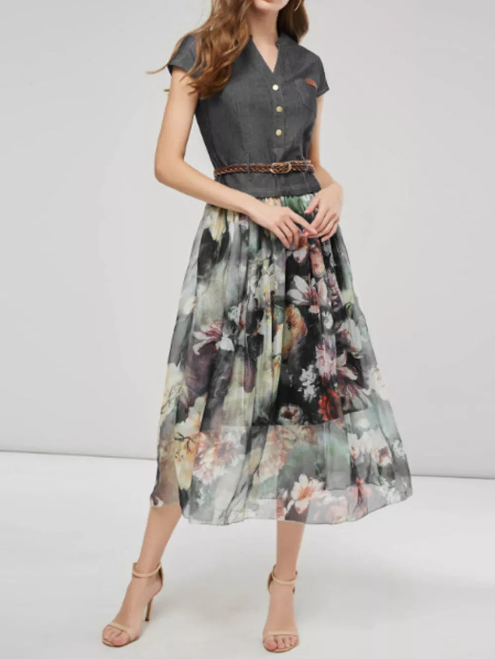 Black denim look button-down maxi dress with a floral chiffon skirt and braided belt.