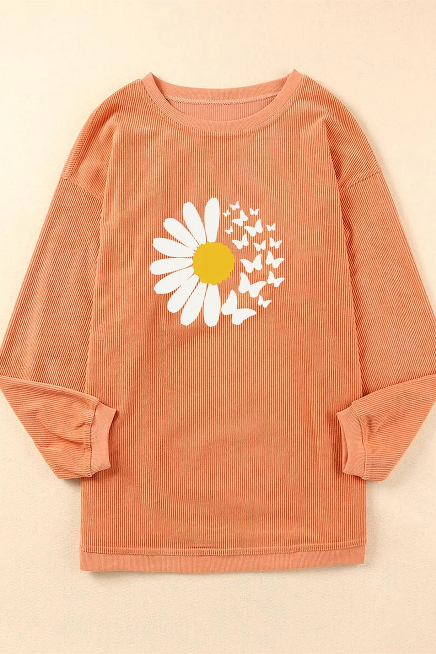 Sherbet corduroy crewneck sweatshirt with daisy and butterfly graphic