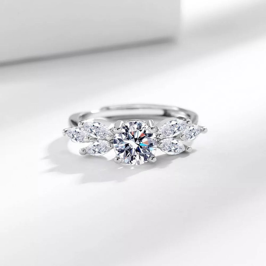 925 sterling silver,Moissanite Carat weight: 1ct Care instructions: While wearin ring in clear with fitted silhouette