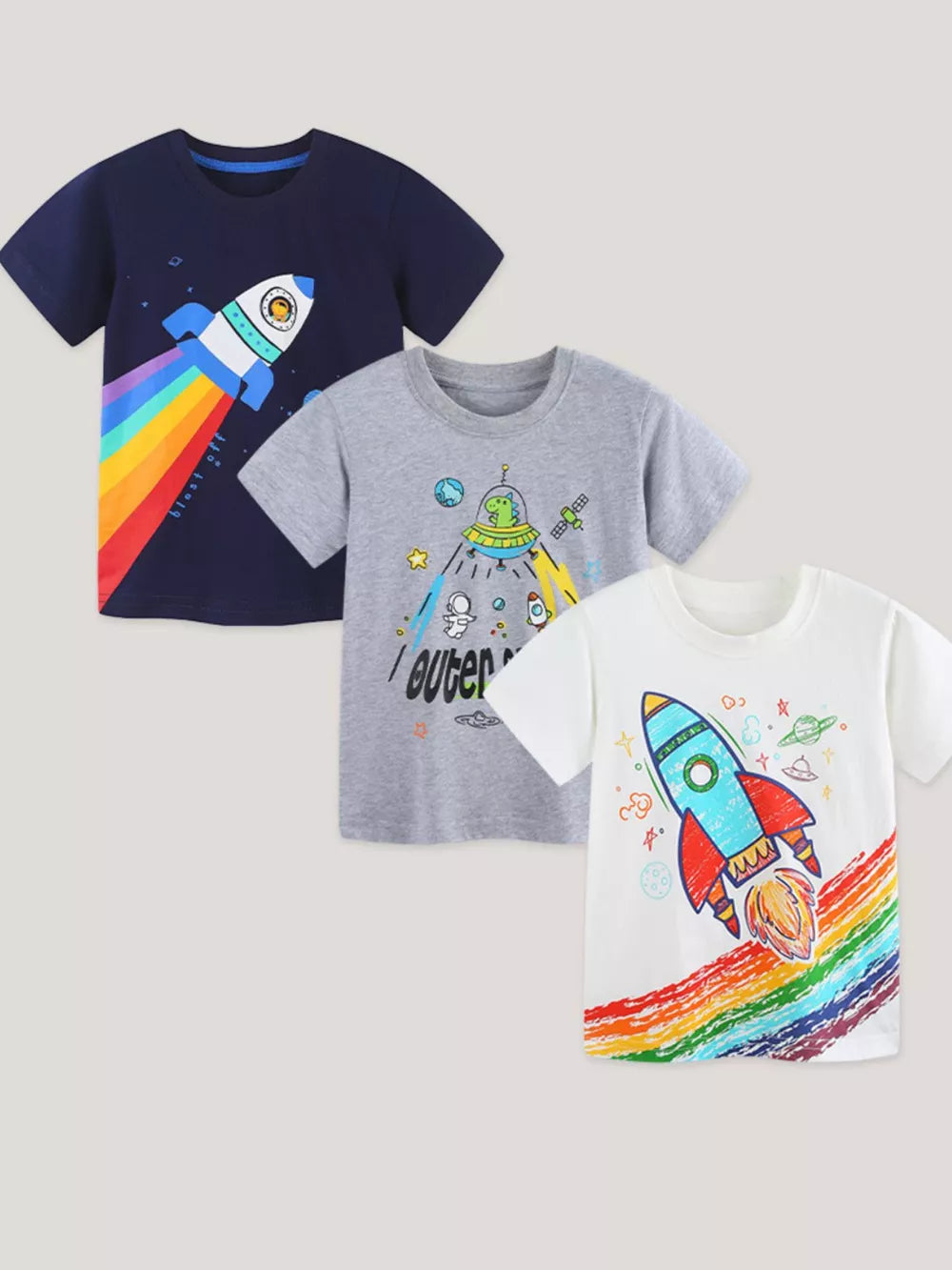 Toddler t-shirt trio with rocket and space graphics in navy, grey, and white cotton.