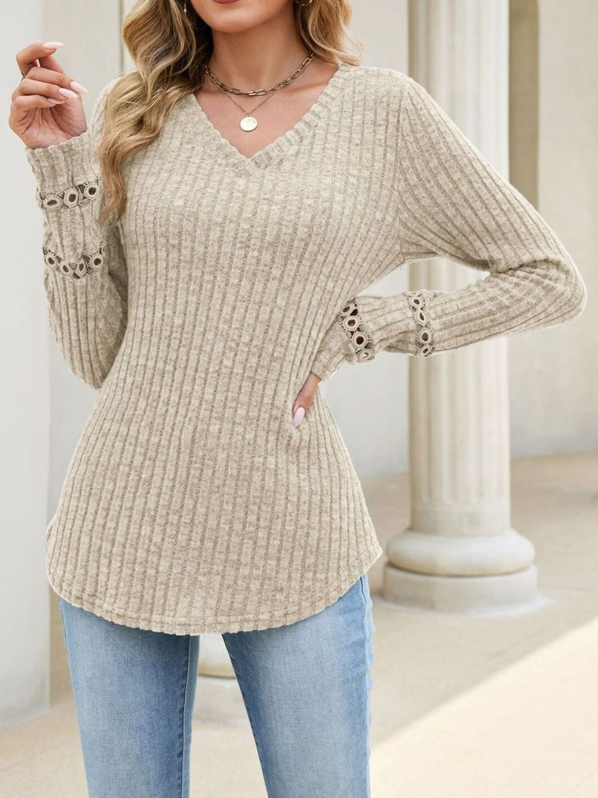light beige v-neck sweater with striped and v-neck