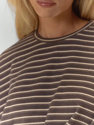 cream pajama set featuring drawstring and striped