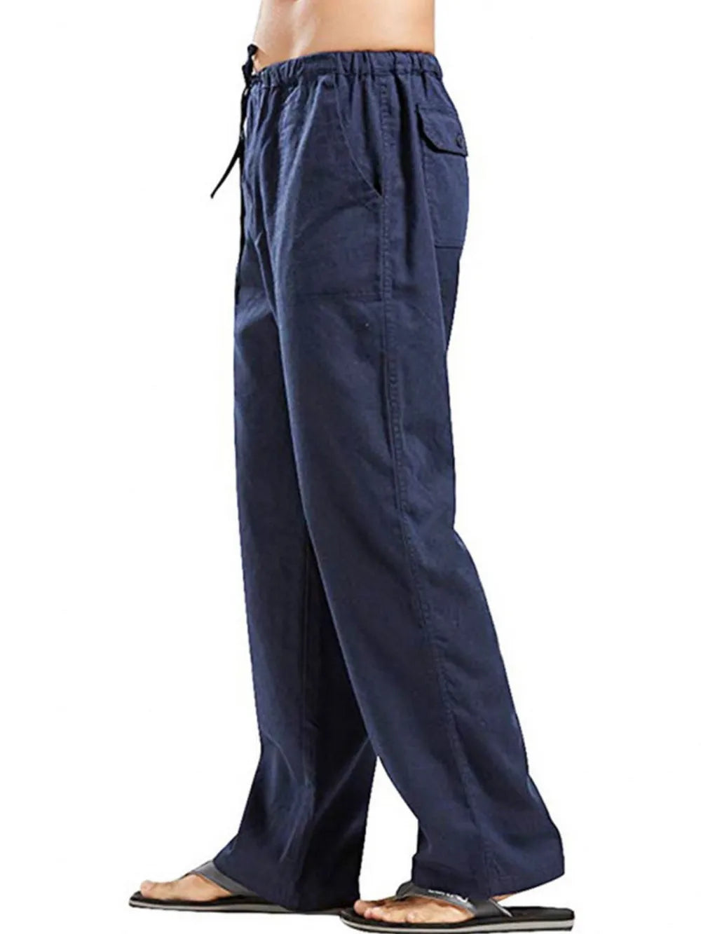Navy linen drawstring trousers with pockets and a relaxed fit.