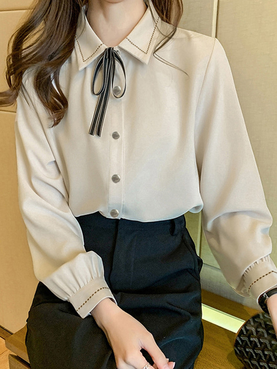 periwinkle blouse with tied and long sleeve