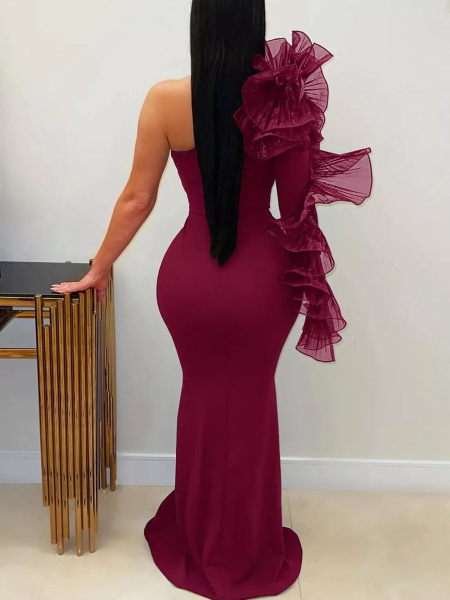 formal gown in Black with ruffled and floor-length