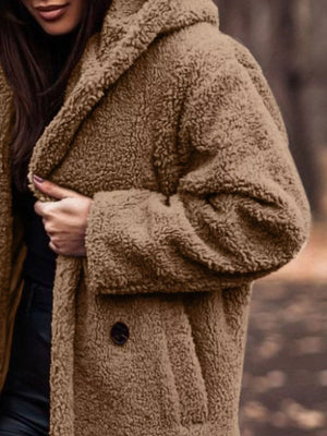 Brown teddy bear longline coat with button detail and hood.