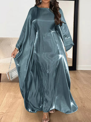 Kimono sleeve maxi dress in deep teal with a flowy silhouette and lustrous finish.