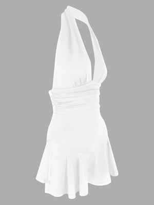 White halter dress with plunging V-neck, ruched waist, and ruffle hem.