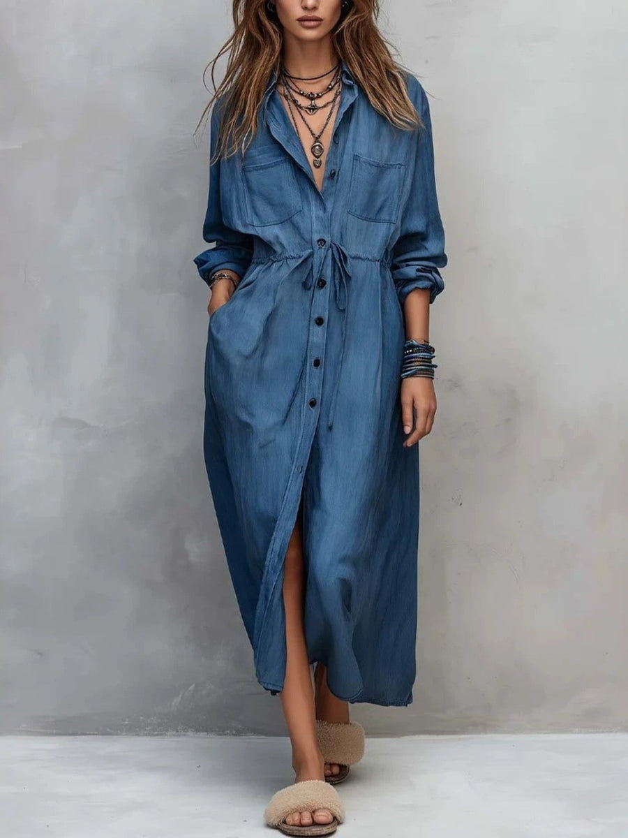shirt dress in denim blue featuring chest pockets and relaxed fit
