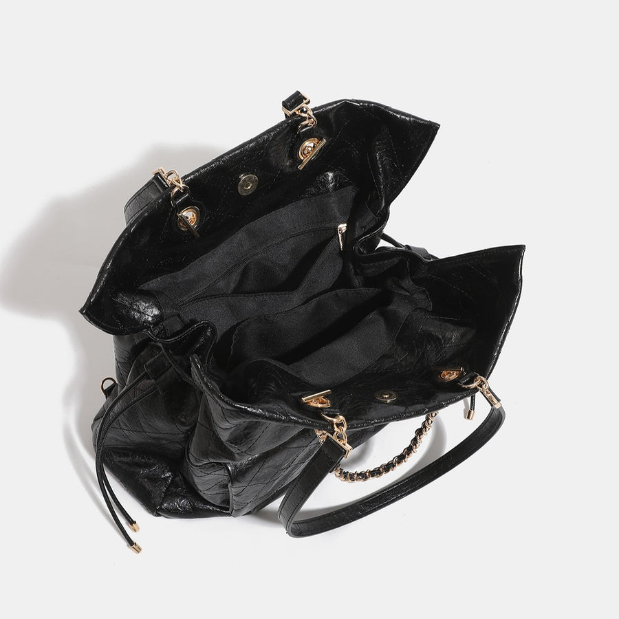 backpack in Black with geometric and quilted