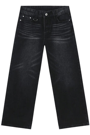 Dark wash wide leg denim jeans with distressed detailing and a D-ring detail.
