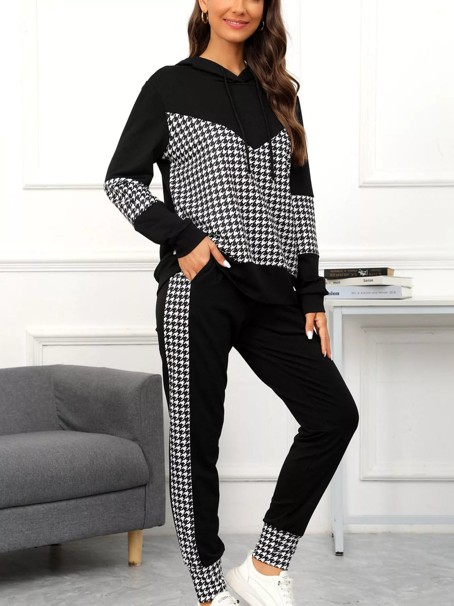 Black houndstooth hoodie and pants set with drawstring and contrast panels.