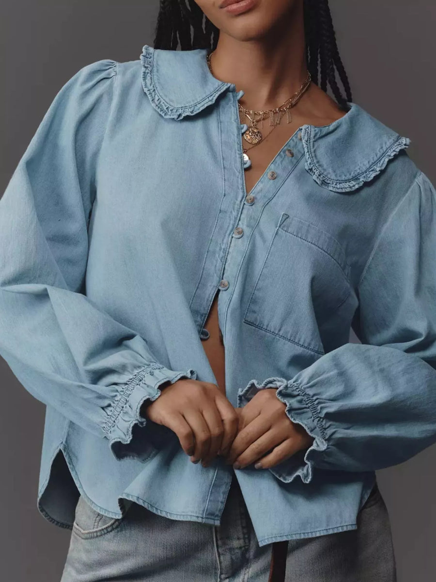 Blue denim shirt with ruffled Peter Pan collar and cinched cuffs