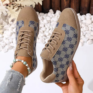 Chic lace-up casual sneakers in khaki with blue monogram pattern and suede trim.