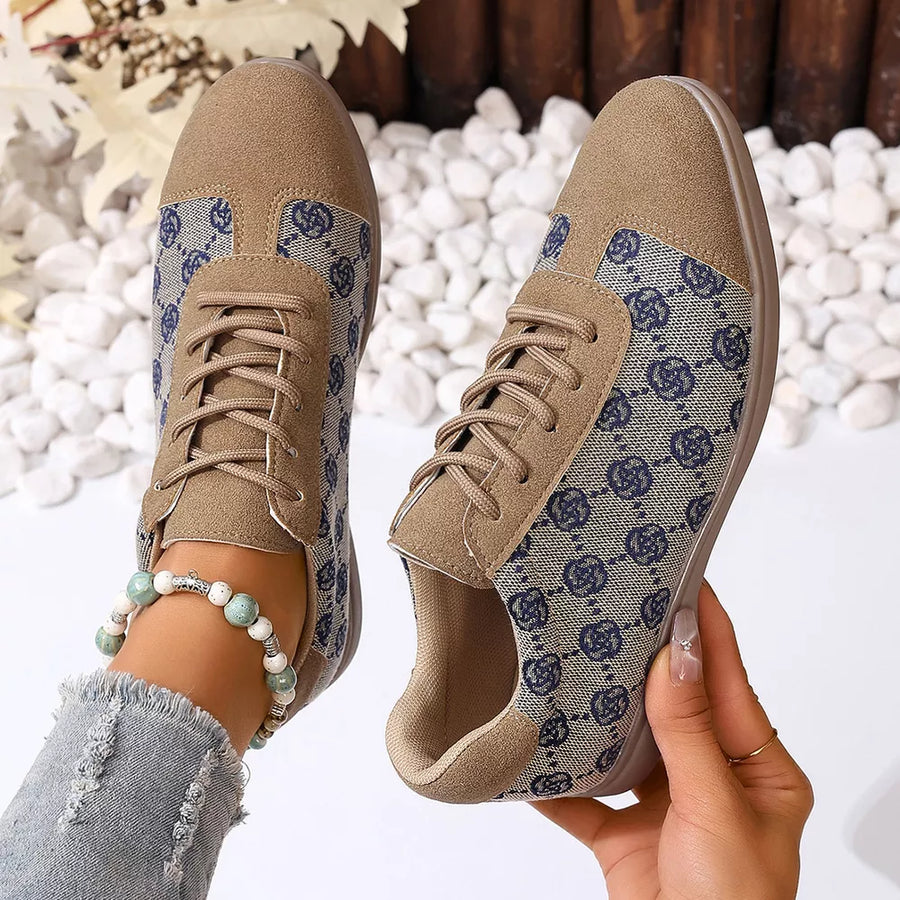 Chic lace-up casual sneakers in khaki with blue monogram pattern and suede trim.