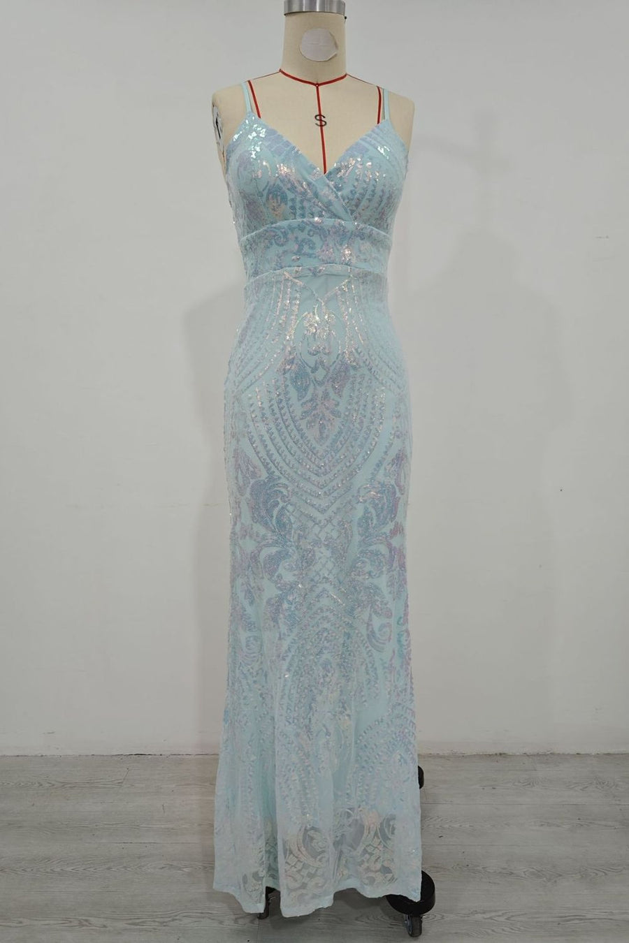 light blue formal gown with lined and spaghetti strap