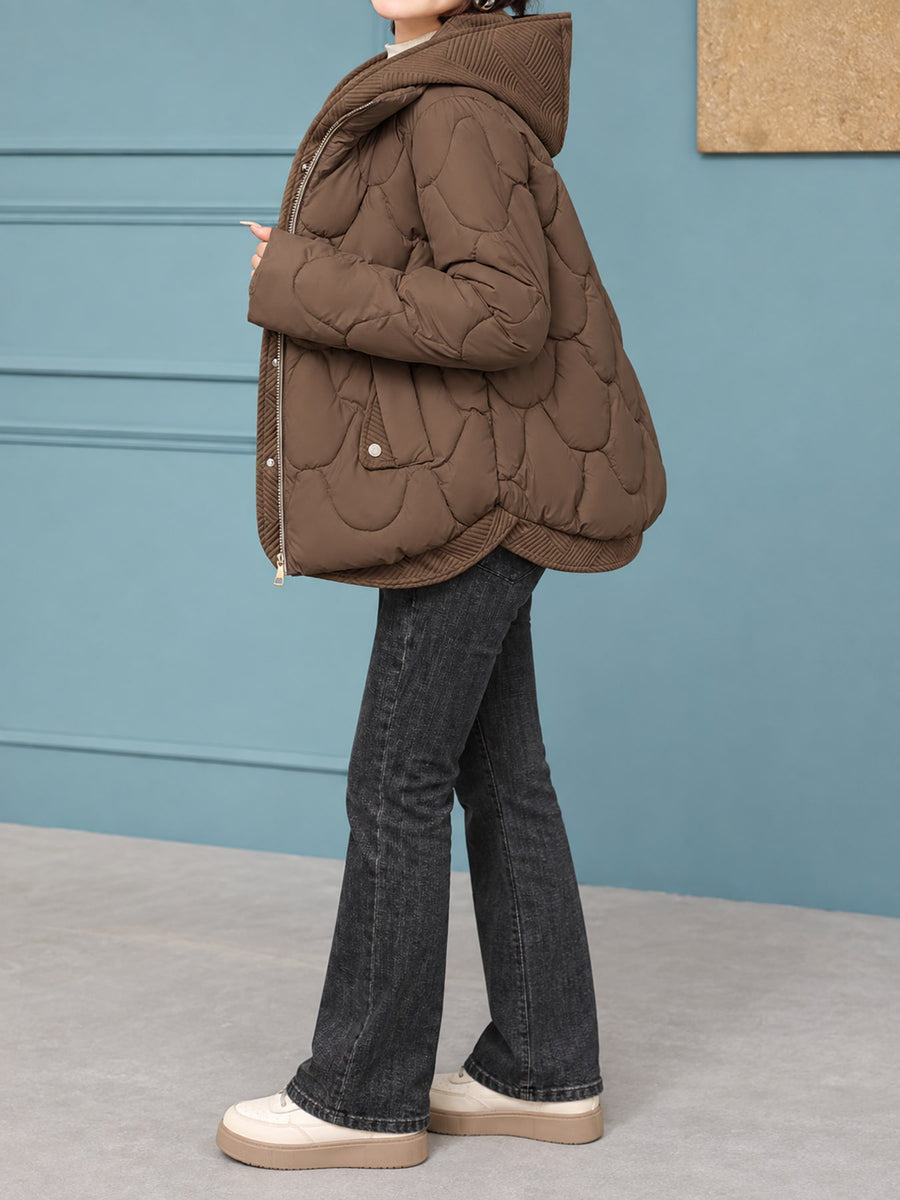 cream quilted jacket with hip-length and zip-front, snap