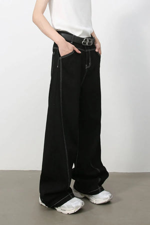 Black relaxed fit jeans with contrast stitching and a wide leg