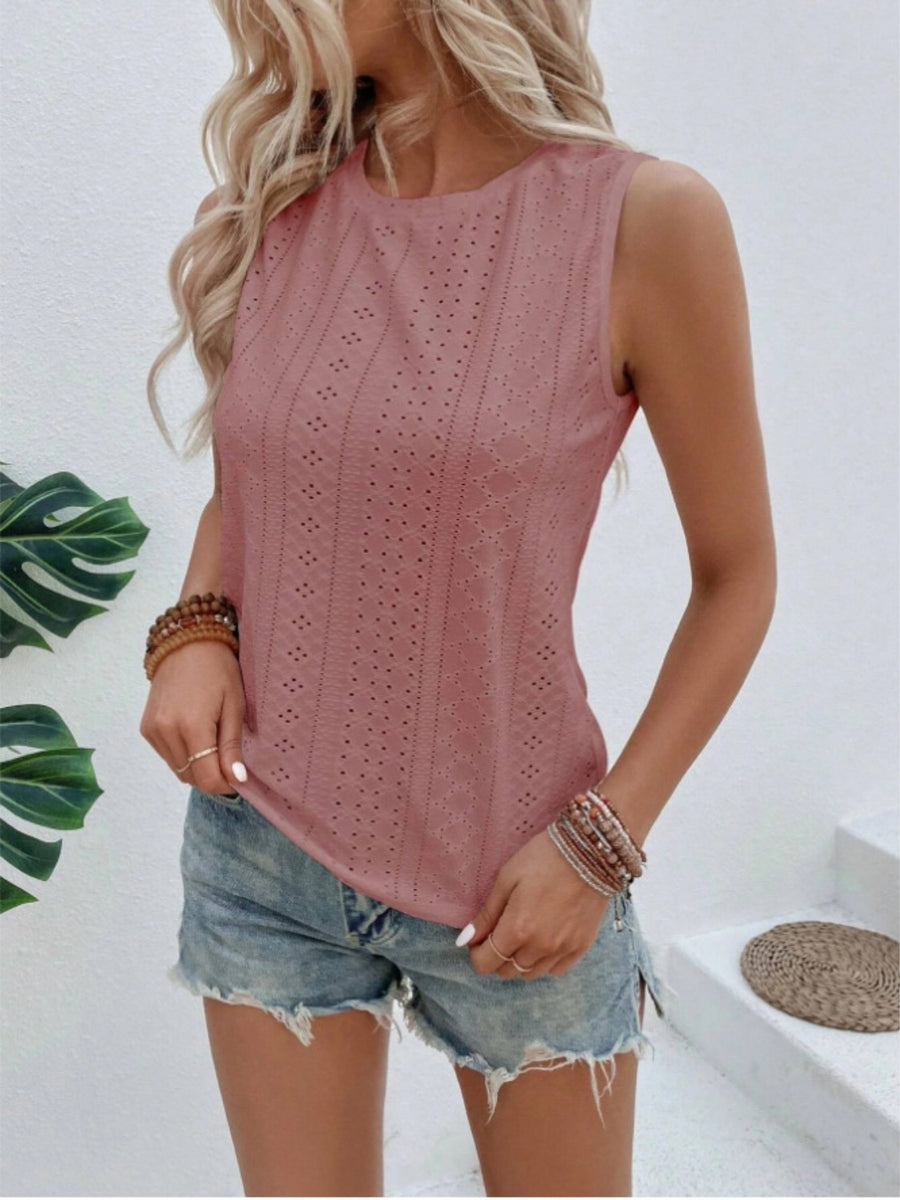 Dusty pink eyelet sleeveless top with round neckline and breathable fabric.