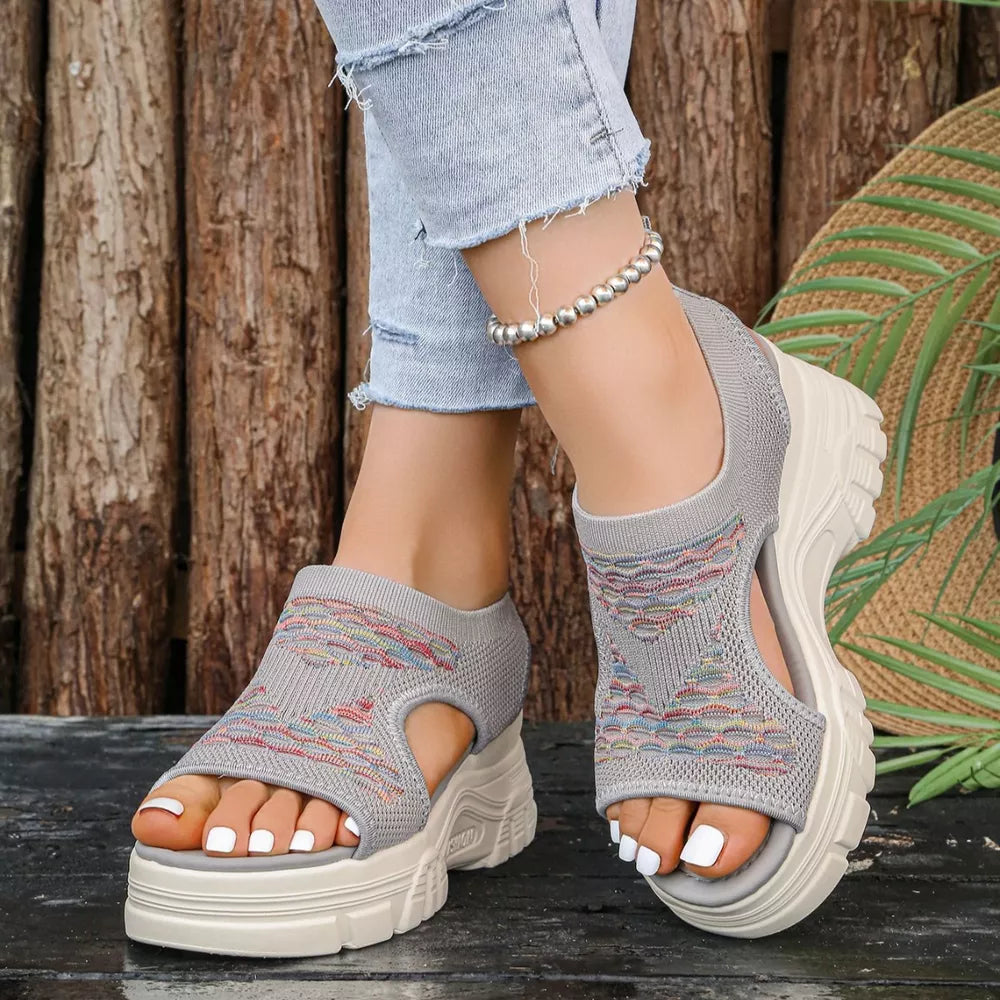 Gray open-toe platform sandals with colorful geometric knit pattern and chunky sole