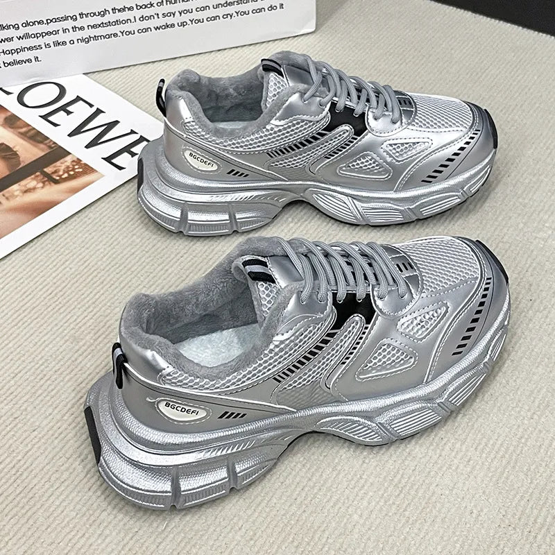Silver lace-up sport platforms with plush lining and breathable mesh detailing.