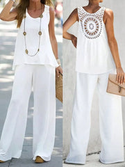 White two-piece set with round neck sleeveless top featuring lace detail and wide-leg pants.