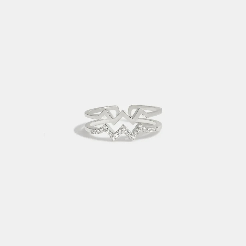 Silver zigzag split band ring with cubic zirconia accents