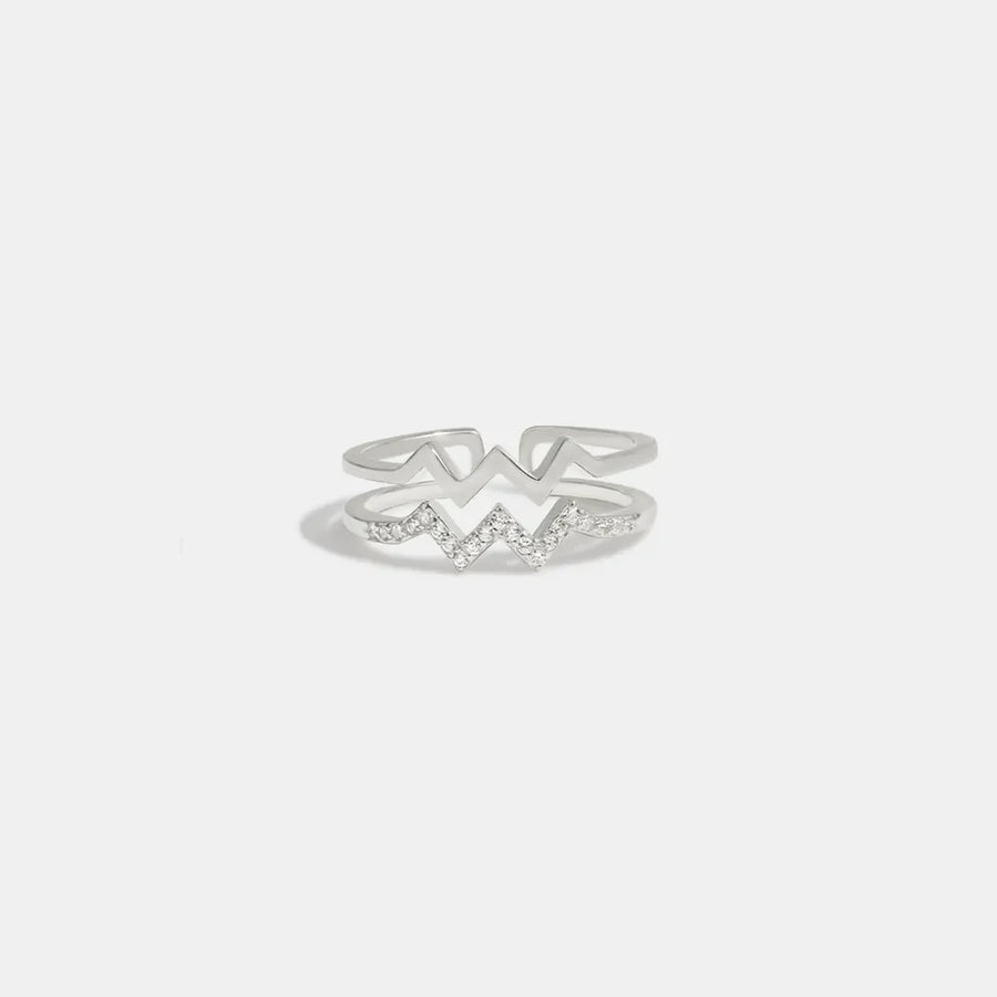 Silver zigzag split band ring with cubic zirconia accents